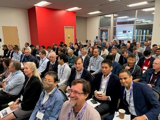 Gerard and other people in seats waiting for a session to start